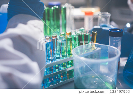Science, laboratory and woman with pipette, test tube and biotech solution in research. Medical innovation, scientist or lab technician in study for healthcare, medicine and vaccine results feedback. Science, laboratory and woman with pipette, test tube and biotech solution in research. Medical innovation, scientist or lab technician in study for healthcare, medicine and vaccine results feedback. 138497993