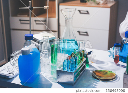 Science, laboratory and woman with pipette, test tube and biotech solution in research. Medical innovation, scientist or lab technician in study for healthcare, medicine and vaccine results feedback. Science, laboratory and woman with pipette, test tube and biotech solution in research. Medical innovation, scientist or lab technician in study for healthcare, medicine and vaccine results feedback. 138498008