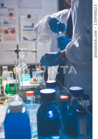 Science, laboratory and woman with pipette, test tube and biotech solution in research. Medical innovation, scientist or lab technician in study for healthcare, medicine and vaccine results feedback. Science, laboratory and woman with pipette, test tube and biotech solution in research. Medical innovation, scientist or lab technician in study for healthcare, medicine and vaccine results feedback. 138498023