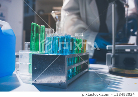 Science, laboratory and woman with pipette, test tube and biotech solution in research. Medical innovation, scientist or lab technician in study for healthcare, medicine and vaccine results feedback. Science, laboratory and woman with pipette, test tube and biotech solution in research. Medical innovation, scientist or lab technician in study for healthcare, medicine and vaccine results feedback. 138498024