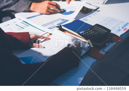 Diverse business people having a team meeting in an office Diverse business people having a team meeting in an office 138498059