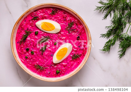 Cold summer soup of beets, yogurt, cucumbers, eggs and dill. 138498104