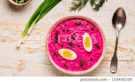 Cold summer soup of beets, yogurt, cucumbers, eggs and dill. 138498109