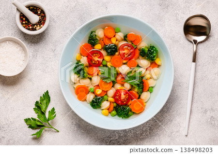 Soup with mini dumplings and vegetables. Soup with mini dumplings and vegetables. 138498203