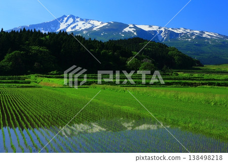 Mt. Chokai and its reflection in the rice fields Mt. Chokai and its reflection in the rice fields 138498218