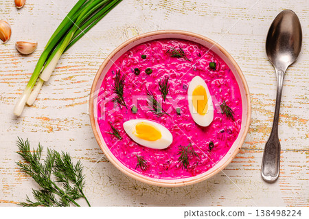 Cold summer soup of beets, yogurt, cucumbers, eggs and dill. 138498224