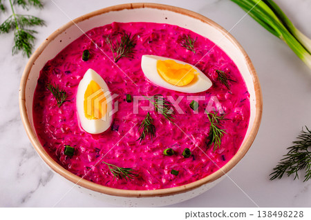 Cold summer soup of beets, yogurt, cucumbers, eggs and dill. 138498228
