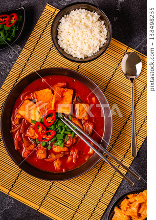 Korean traditional food, spicy kimchi soup (kimchi tige) with pork and tofu cheese. 138498235
