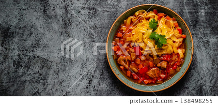 Lagman soup with lamb, homemade noodles and vegetables. Lagman soup with lamb, homemade noodles and vegetables. 138498255
