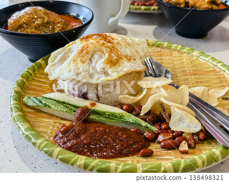 Malaysian cuisine: Rice with coconut milk (nasi lemak) Malaysian cuisine: Rice with coconut milk (nasi lemak) 138498321