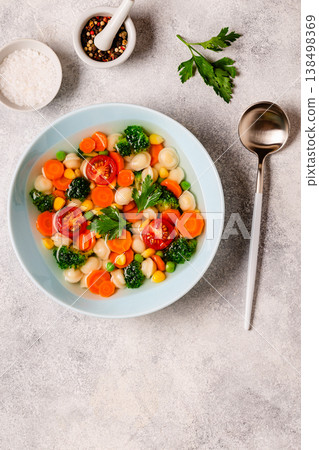 Soup with mini dumplings and vegetables. Soup with mini dumplings and vegetables. 138498369