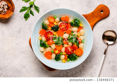 Soup with mini dumplings and vegetables. Soup with mini dumplings and vegetables. 138498371