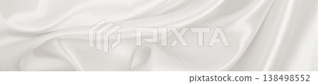 Smooth elegant golden silk or satin luxury cloth texture as wedding background. Luxurious background design. In Sepia toned. Retro style Smooth elegant golden silk or satin luxury cloth texture as wedding background. Luxurious background design. In Sepia toned. Retro style 138498552