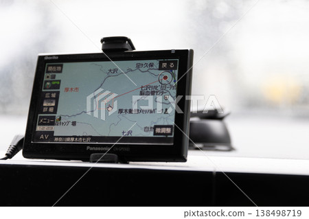 Car navigation system on a rainy day Car navigation system on a rainy day 138498719