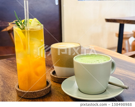 Three types of drinks at the cafe (matcha latte, cafe latte, fruit drink) Three types of drinks at the cafe (matcha latte, cafe latte, fruit drink) 138498988
