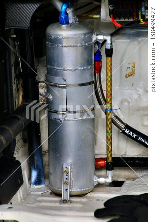 The reservoir tank of the 4AG engine, which has been improved with a dry-sump system. The reservoir tank of the 4AG engine, which has been improved with a dry-sump system. 138499427