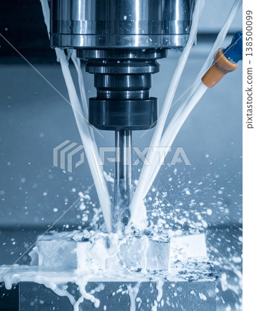 Precision meets power as streams of coolant spray dramatically from the high-speed mil Precision meets power as streams of coolant spray dramatically from the high-speed mil 138500099