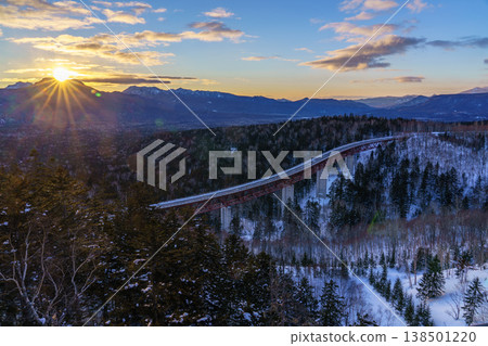 A winter sunrise and bridge viewed from Mikuni Pass: A spectacular view of Hokkaido. 138501220