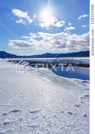 The Taushubetsu River Bridge, buried in snow, is a relic of the former Japanese National Railways in Tokachi, Hokkaido. The Taushubetsu River Bridge, buried in snow, is a relic of the former Japanese National Railways in Tokachi, Hokkaido. 138501406