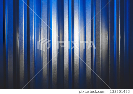 Galvanized iron fence with bright white spot in blue texture background Galvanized iron fence with bright white spot in blue texture background 138501453