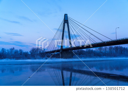 The Tokachi Bridge in winter and the sea fog: A cable-stayed bridge in a fantastical snowy landscape. The Tokachi Bridge in winter and the sea fog: A cable-stayed bridge in a fantastical snowy landscape. 138501712