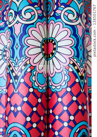Vibrant patterns in Deepavali decor featuring colorful flowers and geometric designs Vibrant patterns in Deepavali decor featuring colorful flowers and geometric designs 138501767