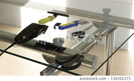 Pet grooming at home: haircutting tools, scissors, comb, trimmer Pet grooming at home: haircutting tools, scissors, comb, trimmer 138502271