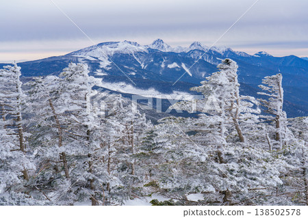 Winter mountain climbing on Mt. Kitayokodake in Nagano: Scenery of the snow-covered Yatsugatake Mountains. Winter mountain climbing on Mt. Kitayokodake in Nagano: Scenery of the snow-covered Yatsugatake Mountains. 138502578
