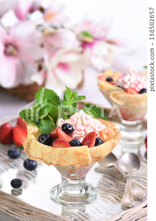 French Crepes with Filling and Fruit French Crepes with Filling and Fruit 138502657