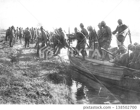 Old photograph, December 1937, during the Second Sino-Japanese War: Japanese Army soldiers crossing Lake Tai in Yixing, Jiangsu Province by boat. 138502700