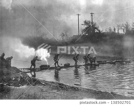 Old photograph: November 11, 1937, during the Second Sino-Japanese War, Japanese Army soldiers crossing a river in the South City of Shanghai. 138502701