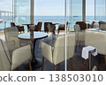 Seating area in a coastal restaurant by the sea 138503010