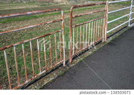 Rusted guard pipes due to aging 138503071