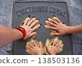 Dad, mom and baby. Close-up of a hand 138503136