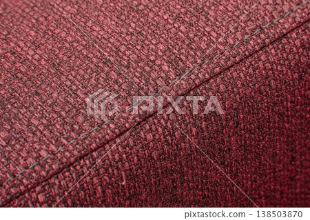 Textured red furniture fabric with stitching 138503870