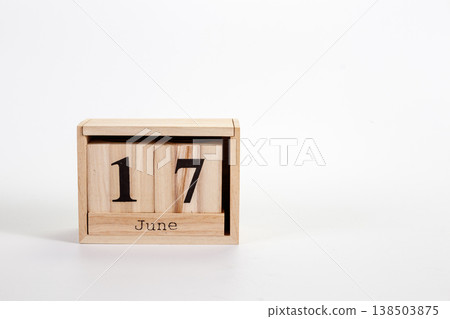 Wooden calendar June 17 on a white background 138503875