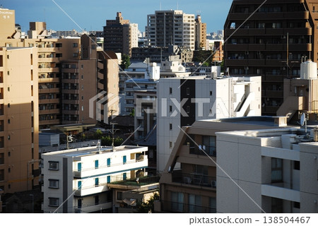 The rooftops of buildings and apartments in densely populated cities The rooftops of buildings and apartments in densely populated cities 138504467
