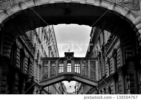 Black and white arch framing skybridge between historic buildings Black and white arch framing skybridge between historic buildings 138504767