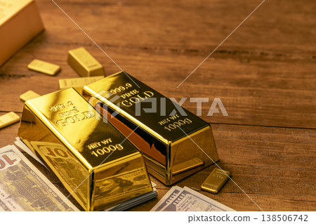 Gold Bars 1000g Net Weight - Premium Investment and Financial Assets Displayed on Wooden Desk with Currency Gold Bars 1000g Net Weight - Premium Investment and Financial Assets Displayed on Wooden Desk with Currency 138506742