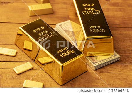 Gold Bullion Bars with Cash Money: Precious Metal Investment and Financial Wealth Display on Wooden Background Gold Bullion Bars with Cash Money: Precious Metal Investment and Financial Wealth Display on Wooden Background 138506748