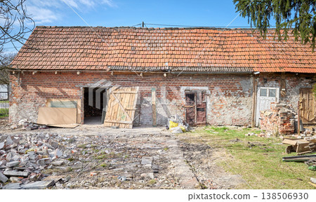 Demolition of an old building in the garden. 138506930