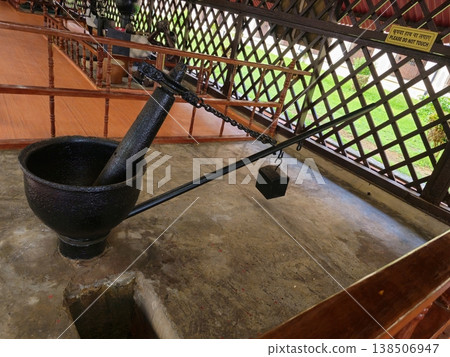 Andaman and Nicobar Islands, 29th May 2024. A heavy black iron oil mill (Kolhu), a tool of hard labor used by political prisoners during the British era. Andaman and Nicobar Islands, 29th May 2024. A heavy black iron oil mill (Kolhu), a tool of hard labor used by political prisoners during the British era. 138506947
