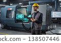 Engineer with Augmented Reality Tablet Diagnosing Factory Equipment 138507446