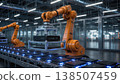 Orange Robotic Arm Sorting Modules on LED Conveyor Belt 138507459