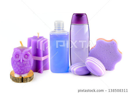 Set of purple and violet spa products including candles, soap, shower gel, shampoo, and star shaped sponge isolated on white background. Beauty and body care hygiene concept for wellness and Set of purple and violet spa products including candles, soap, shower gel, shampoo, and star shaped sponge isolated on white background. Beauty and body care hygiene concept for wellness and 138508311