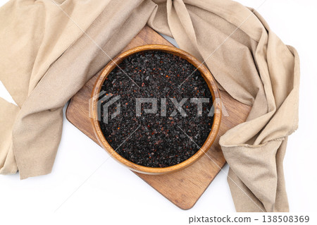 Dried Isot Pepper Flakes in a Wooden Bowl Isolated on White Background - Traditional Turkish Chili 138508369