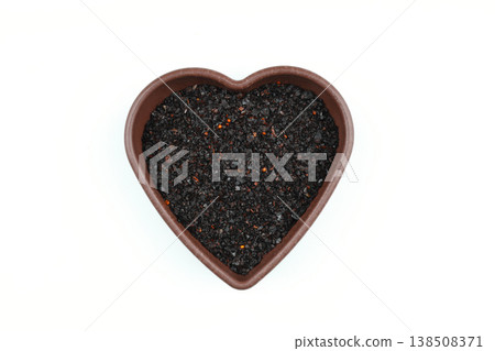 Dried Isot Pepper Flakes in a Heart Shaped Wooden Bowl - Traditional Turkish Urfa Chili Background 138508371