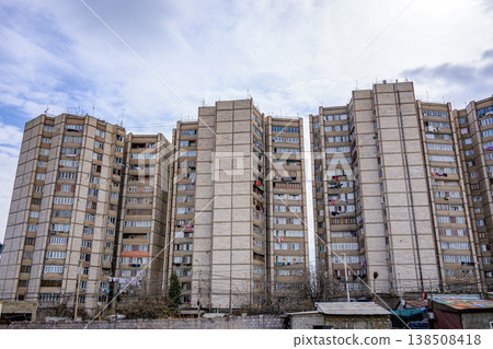 Multi-story residential buildings with faded balconies Multi-story residential buildings with faded balconies 138508418