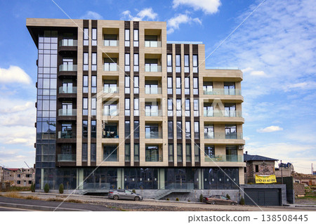 High-rise residential building under bright daylight High-rise residential building under bright daylight 138508445