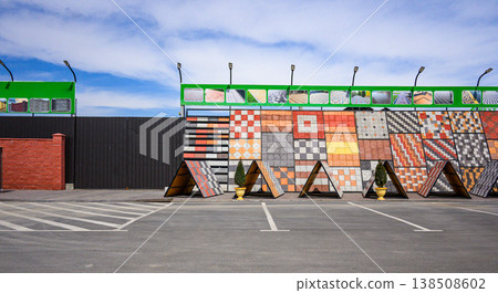Tiles arranged in a row, showcasing patterns and colors Tiles arranged in a row, showcasing patterns and colors 138508602